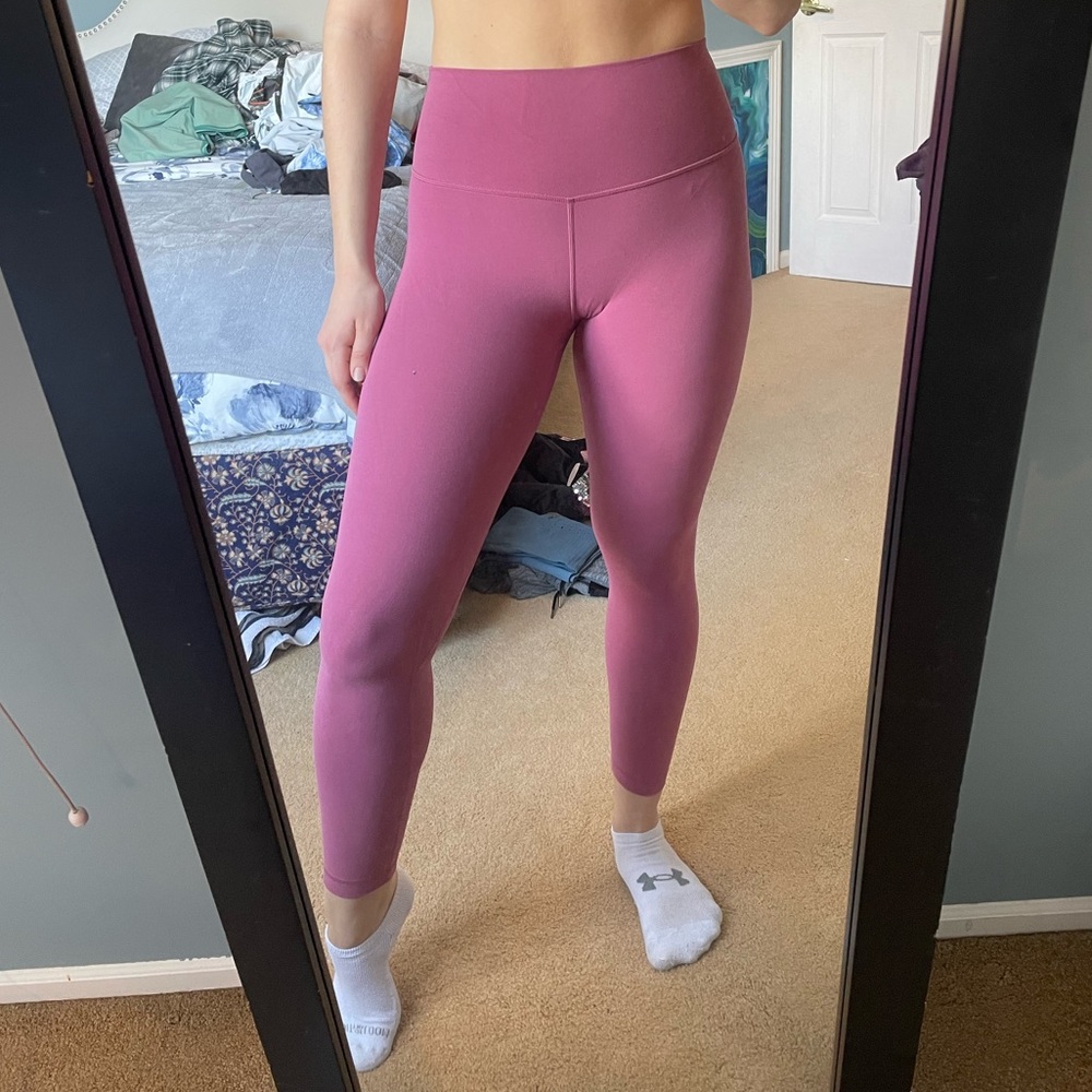 Dusty pink lululemon aligns. Never worn!!! Size 4